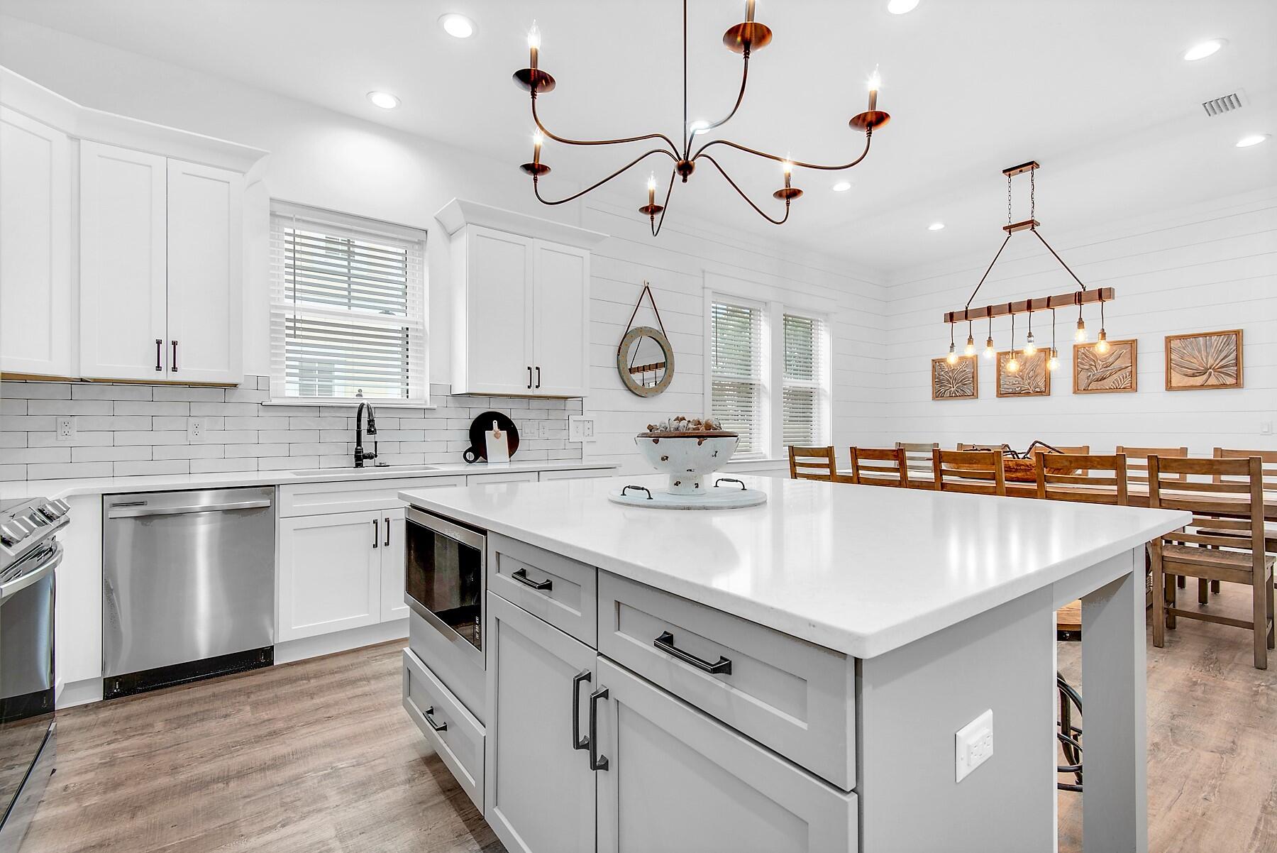 4541 Luke Avenue Destin, FL 32541 - Photo 10 of 49 a kitchen with a sink and cabinets