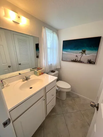 a view of room with cabinets