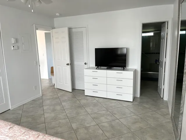 a view of a golf course with a swimming pool