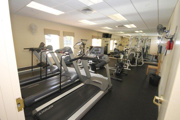 2515 Northeast 1st Court, Unit 411 Boynton Beach, FL 33435 - Photo 20 of 22 a view of a room with gym equipment