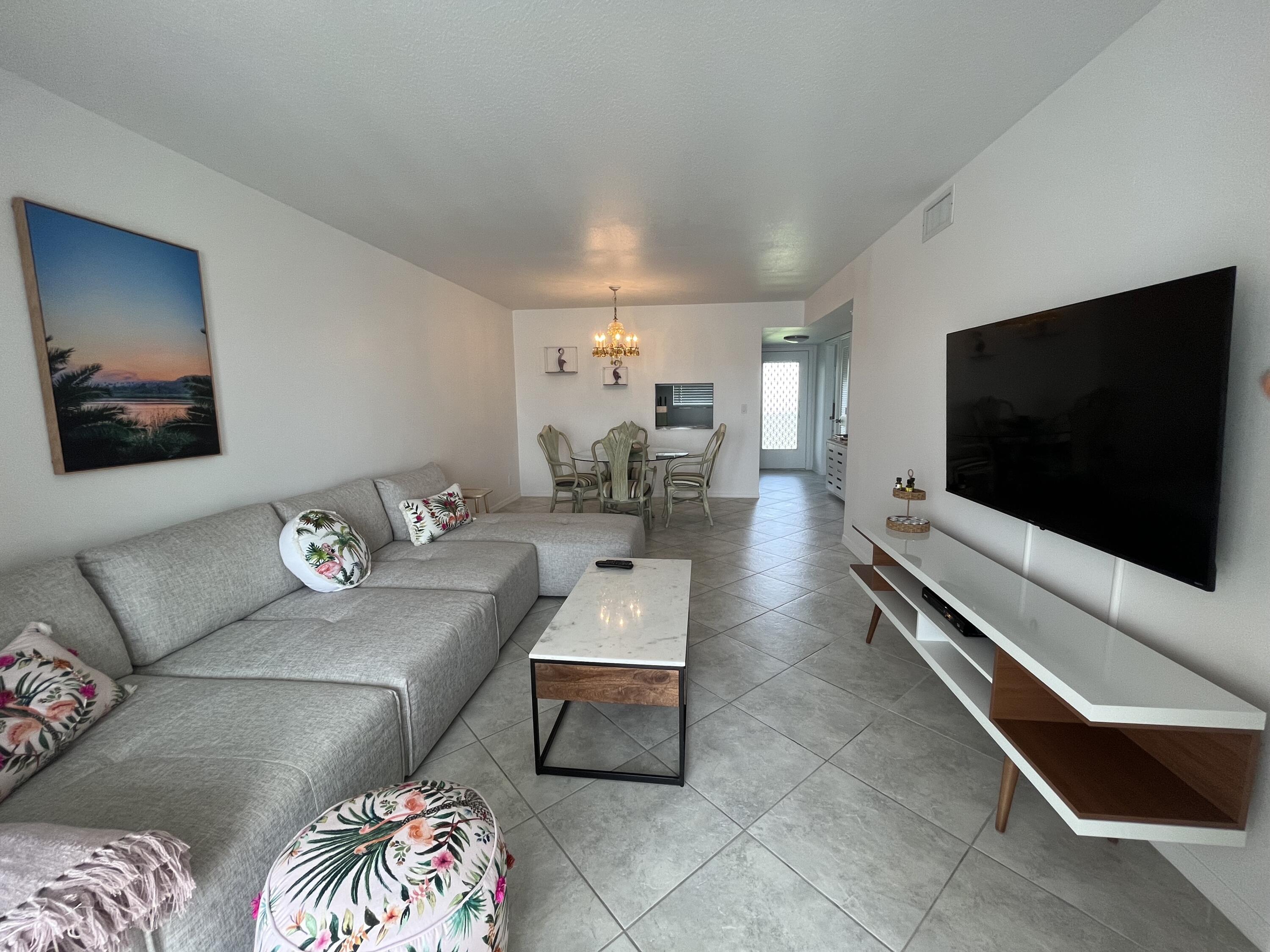 2515 Northeast 1st Court, Unit 411 Boynton Beach, FL 33435 - Photo 3 of 22 Spacious & modern living room