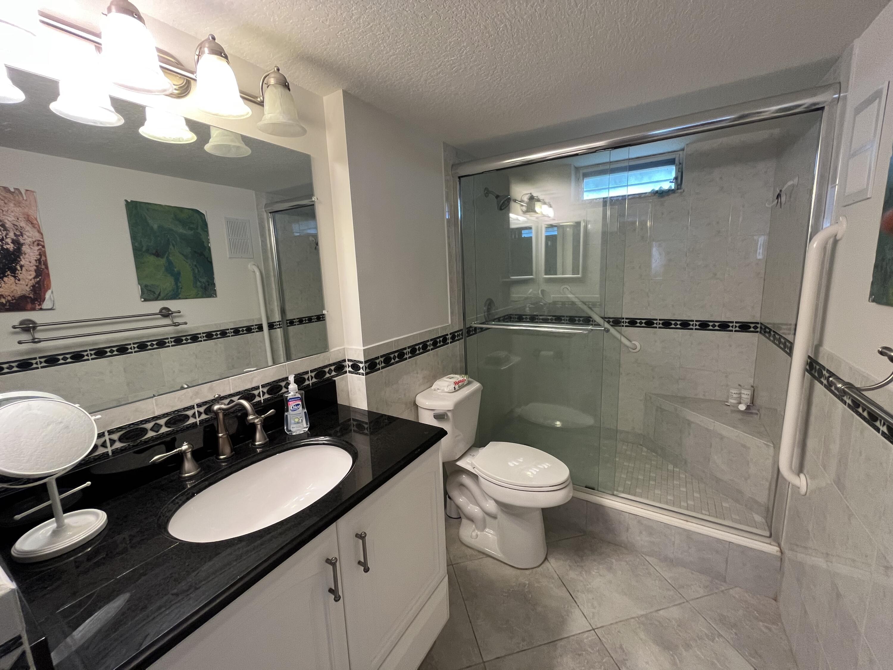 2515 Northeast 1st Court, Unit 411 Boynton Beach, FL 33435 - Photo 6 of 22 Beautiful upgraded master bathroom