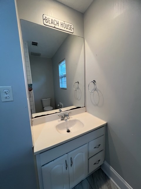 3401 17th Avenue Columbus, GA 31904 - Photo 11 of 26 a bathroom with a sink and a mirror