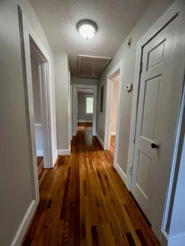 a view of a hallway from a hallway