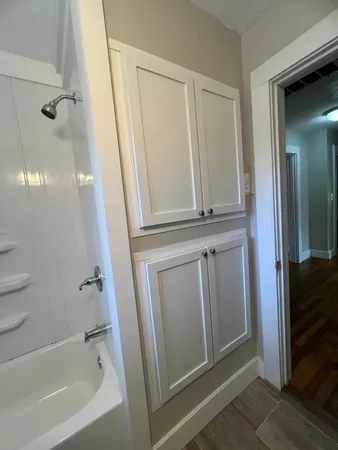 a bathroom with a bathtub