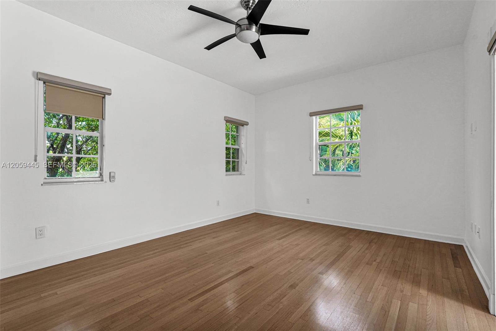 244 Southwest 28th Road Miami, FL 33129 - Photo 48 of 70 Bedroom #1 - Second Floor - Primary Bedroom,Wood Floor, Walk-in Closet - Ensuite Bathroom and private balcony / terrace
