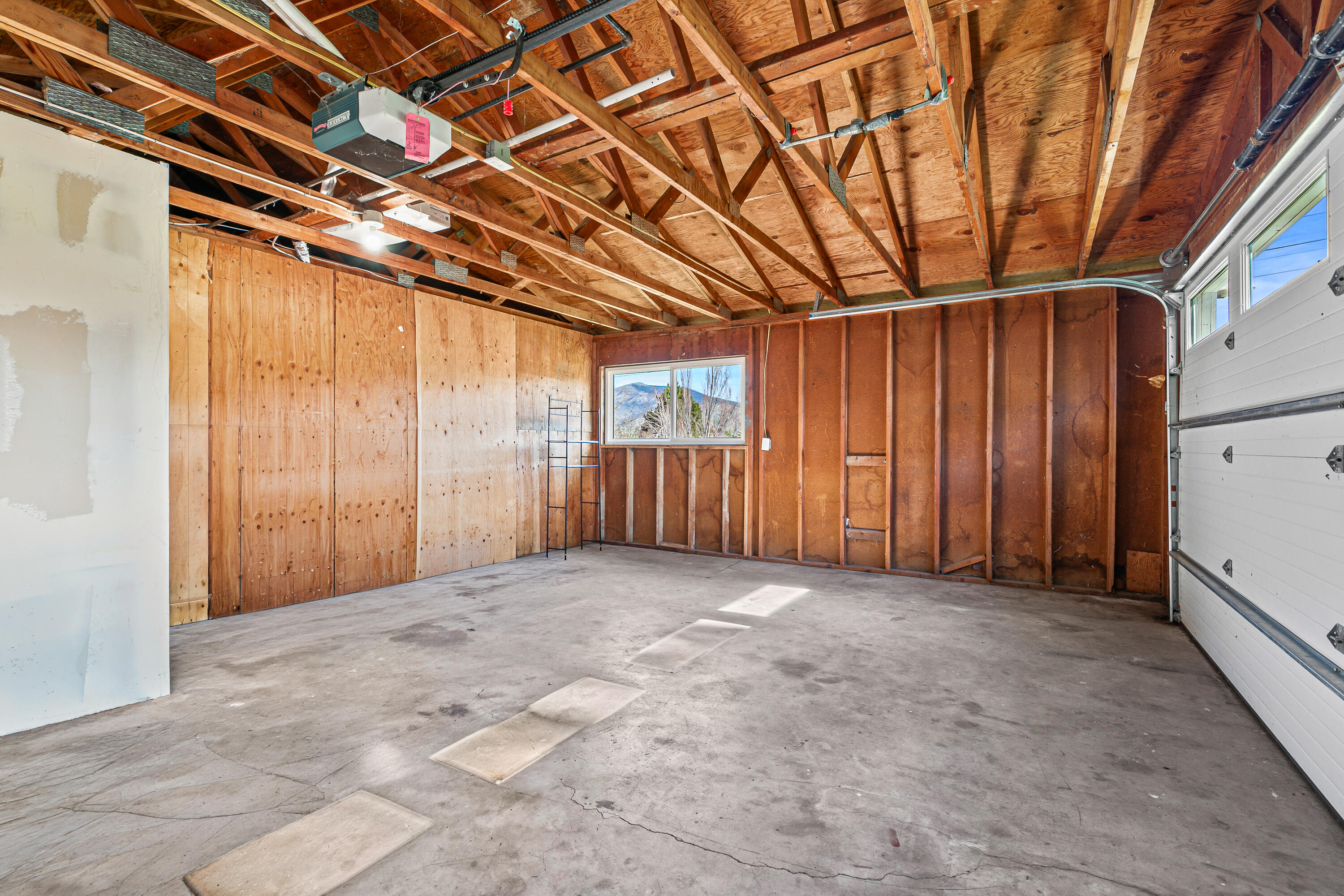 593 Crowson Road Ashland, OR 97520 - Photo 33 of 36 a view of empty room with wooden walls