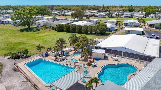 an outdoor space with furniture and garden view
