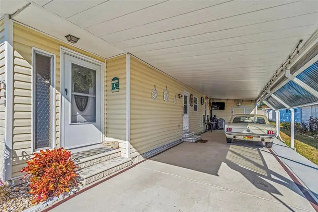 a balcony view with a sitting space