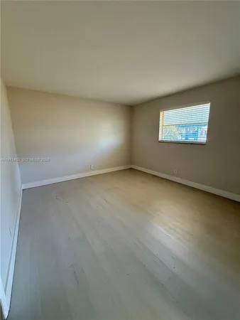 an empty room with a workbench