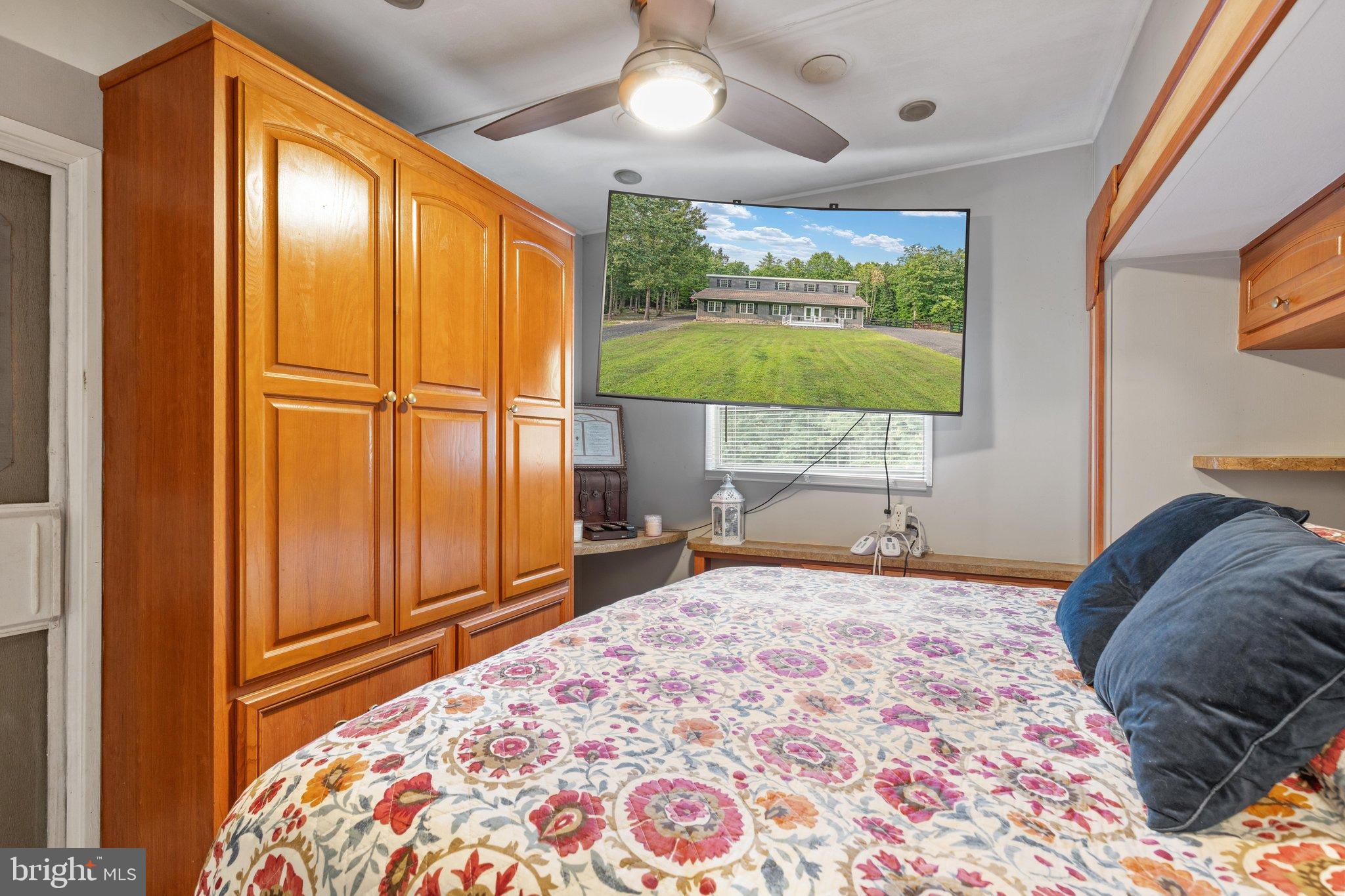 0 Flat Iron Road Montross, VA 22520 - Photo 61 of 116 Cozy bedroom with modern amenities and views.