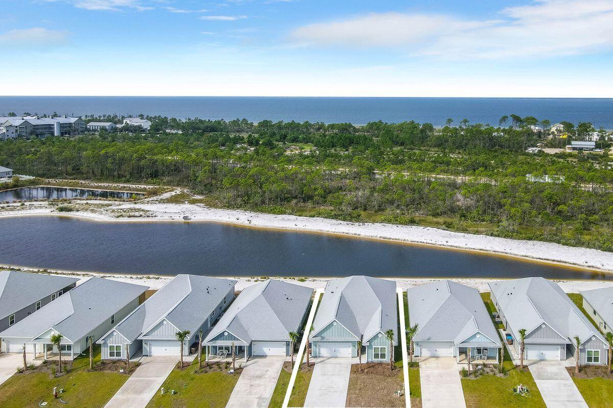 769 Backwater Road Port St. Joe, FL 32456 - Photo 2 of 45 an aerial view of residential houses with outdoor space and ocean view