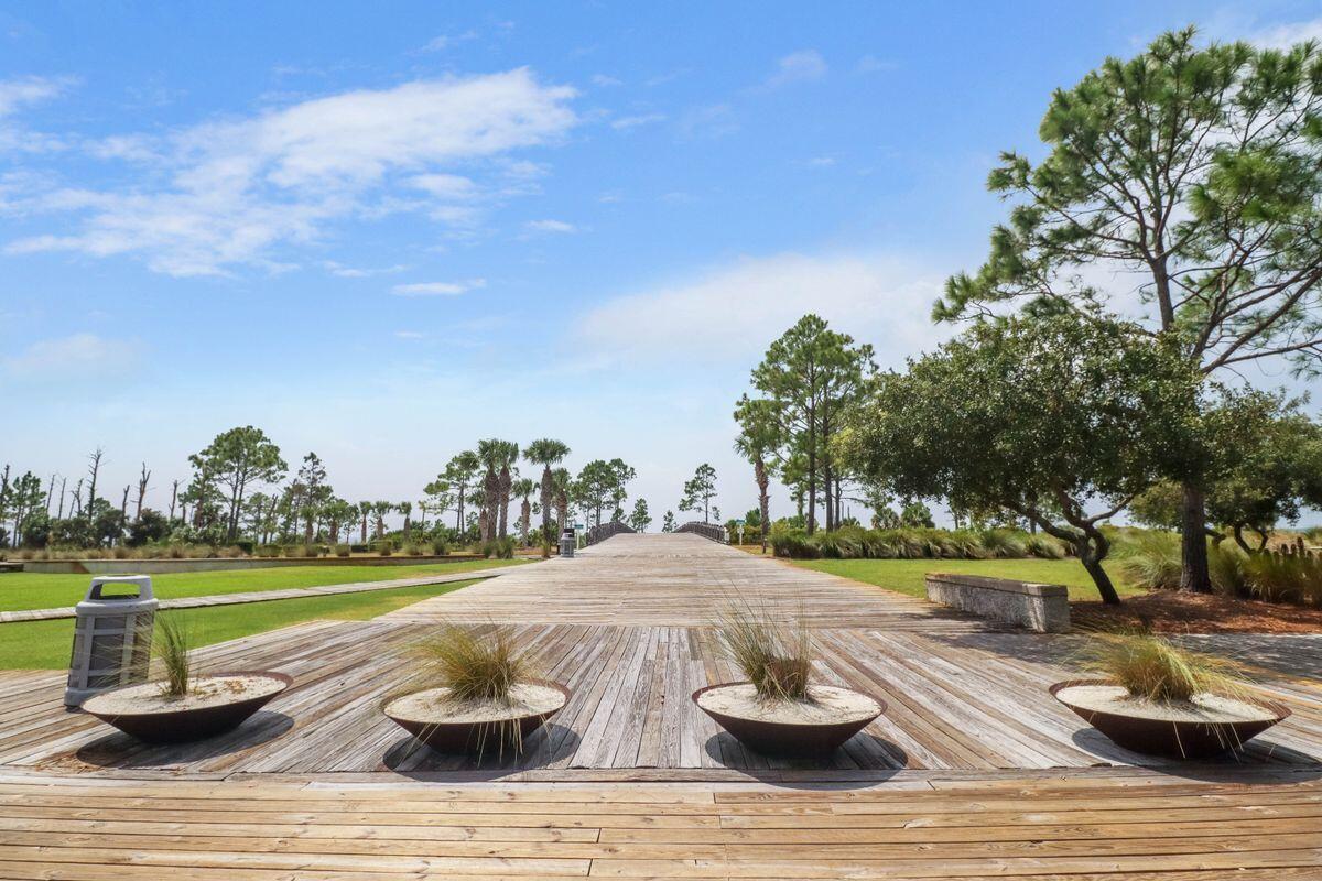 769 Backwater Road Port St. Joe, FL 32456 - Photo 38 of 45 a wooden bench sitting on top of a wooden floor