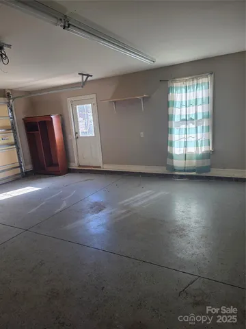 a room with furniture and window