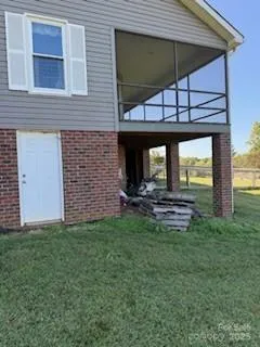 a view of a backyard with plants