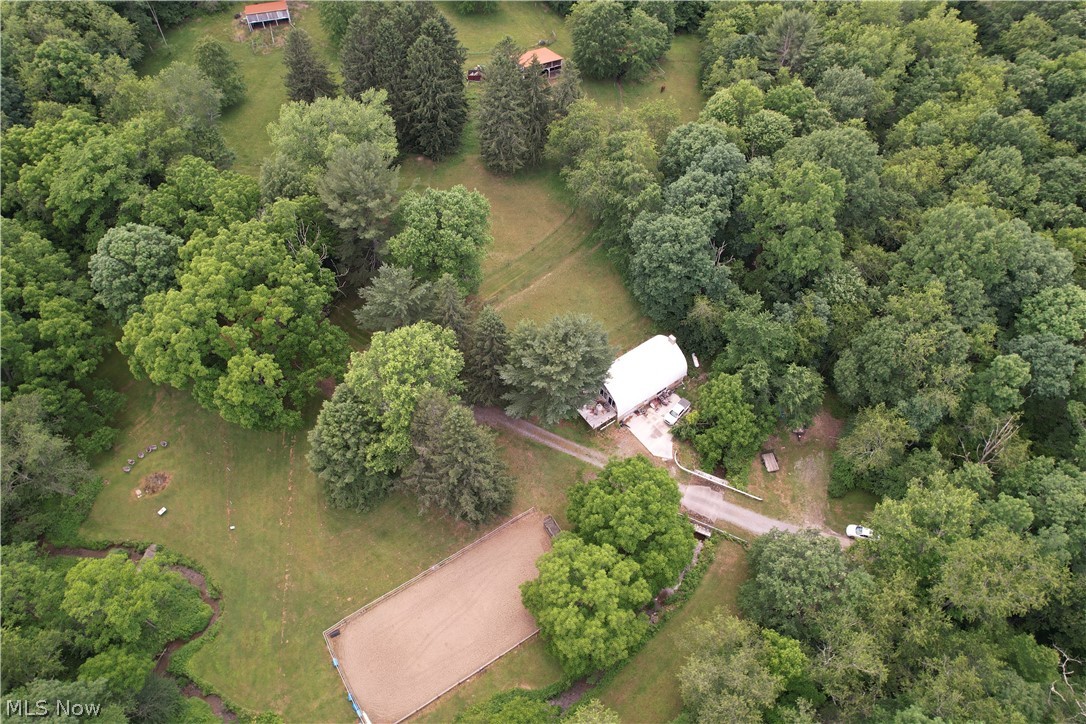 11811 Gaston Road Rogers, OH 44455 - Photo 36 of 38 WELCOME TO PARADISE! 11811 Gaston Rd. Negley/Rogers, OHIO sits on nearly 28 acres of land, with a functional and featured cabin to relax in! Not to mention the Q-Hut that's over 1,000 square feet and has electric, the horse arena is 50x80 and there's plenty of usable space that could be built out for your needs. Schedule your appointment today!