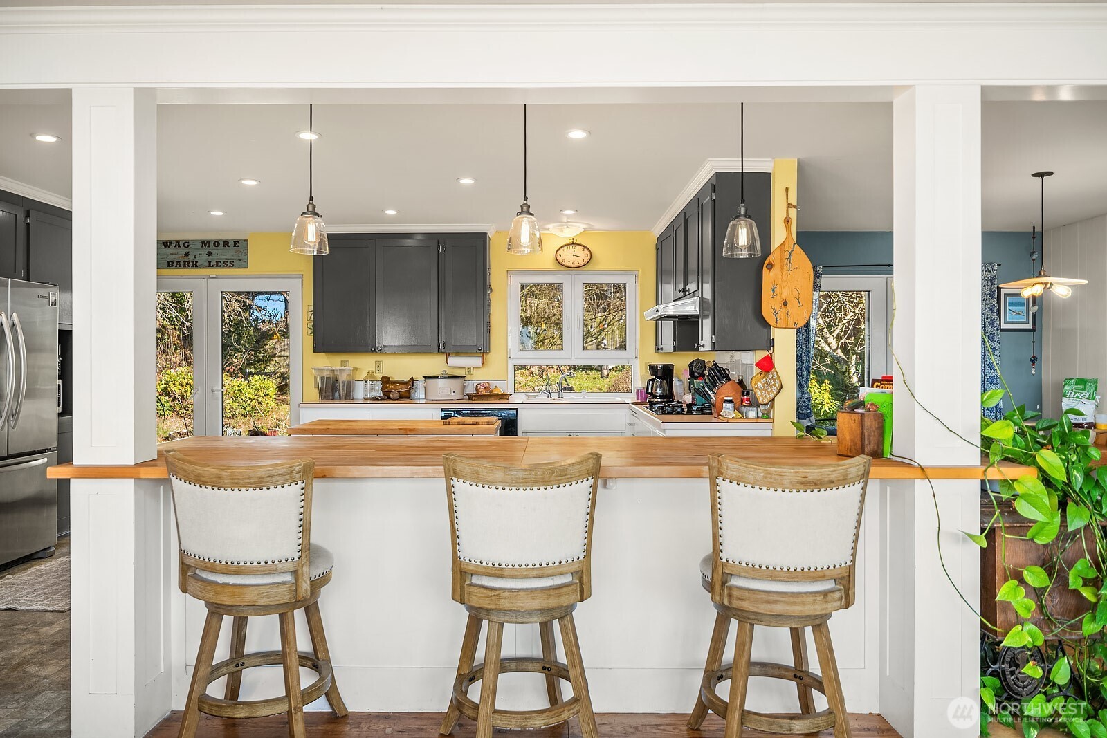 856 Stetson Avenue Kent, WA 98031 - Photo 11 of 39 a kitchen with stainless steel appliances kitchen island granite countertop a sink and cabinets