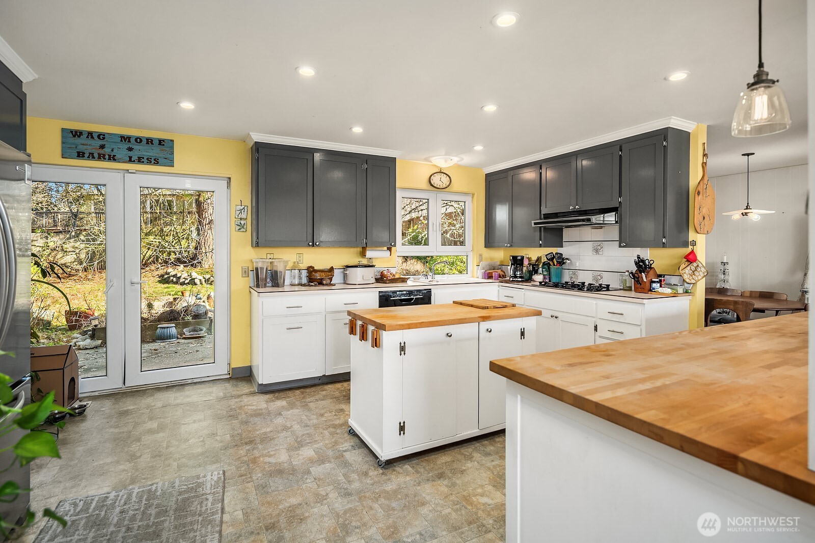 856 Stetson Avenue Kent, WA 98031 - Photo 12 of 39 a kitchen with stainless steel appliances granite countertop a stove a sink a refrigerator and a oven