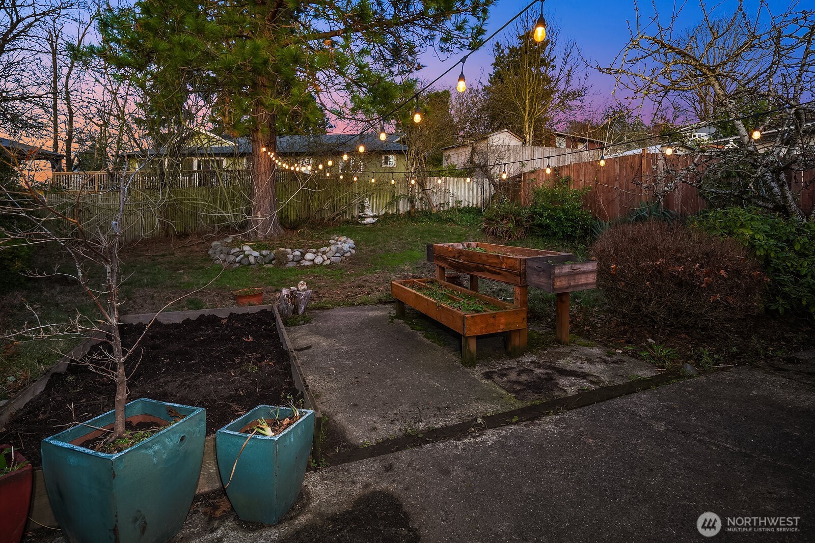 856 Stetson Avenue Kent, WA 98031 - Photo 35 of 39 a view of a backyard with plants and a patio