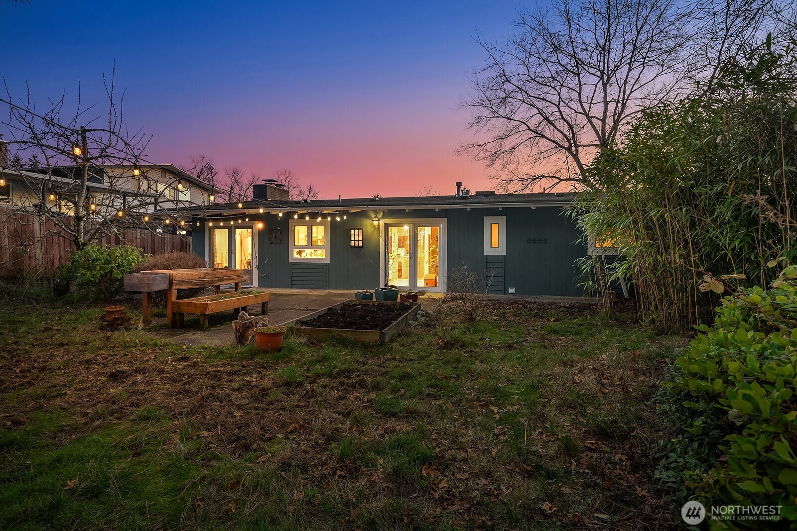 856 Stetson Avenue Kent, WA 98031 - Photo 37 of 39 a backyard of a house with barbeque oven fire pit and outdoor seating