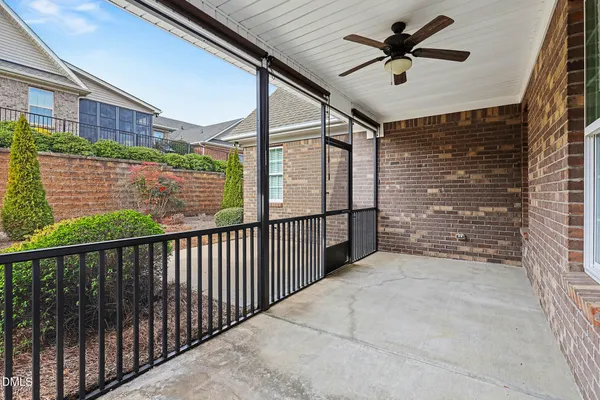 a view of a porch with wooden floor and outdoor space