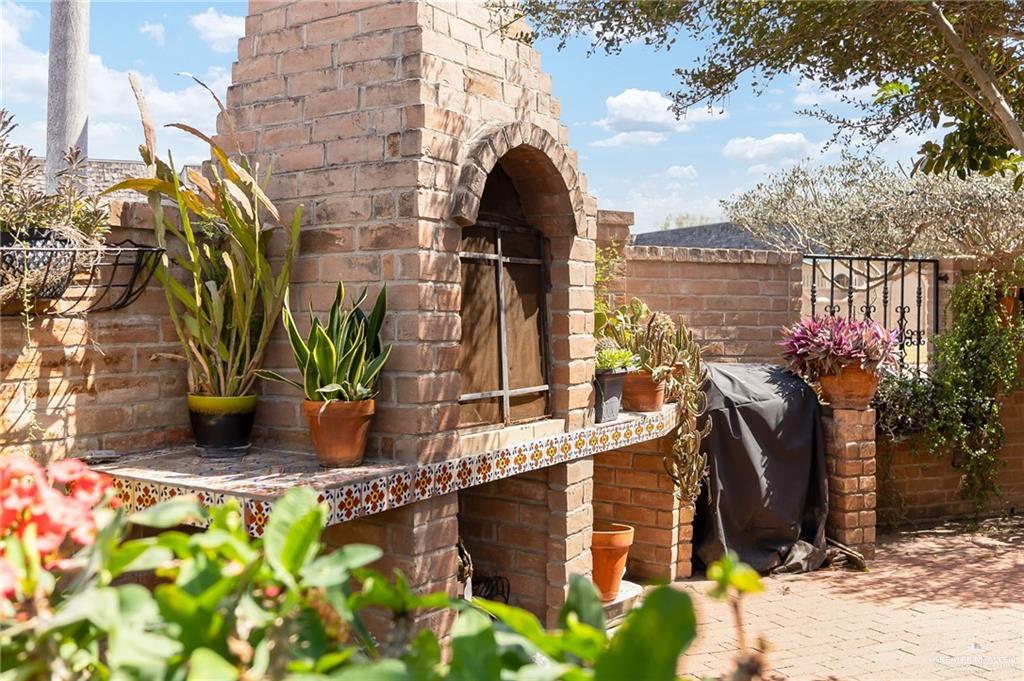 301 Vermont Avenue McAllen, TX 78503 - Photo 18 of 25 a front view of a house with a yard
