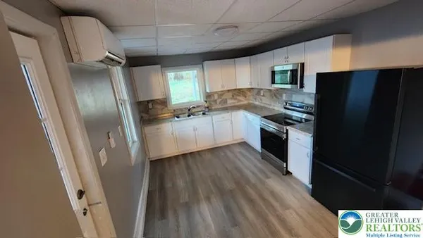 a view of outdoor space and barbecue grill