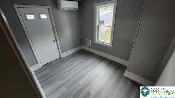 a bathroom with a sink toilet and tub