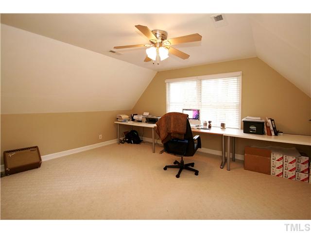7900 Farmingwood Lane Raleigh, NC 27615 - Photo 14 of 25 a view of a workspace with a window