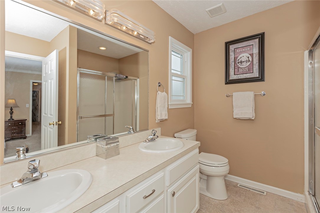 5420 Bartlett Road Bedford, OH 44146 - Photo 13 of 32 En-suite bathroom. Double sink.