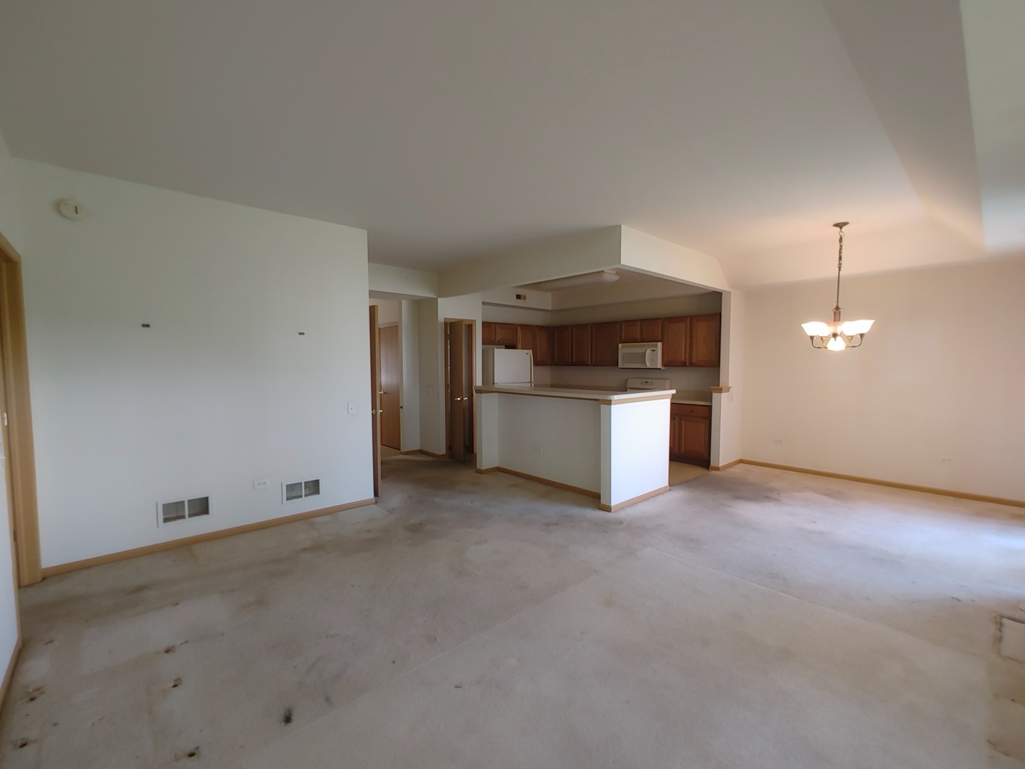 13528 Delaney Road Huntley, IL 60142 - Photo 5 of 25 a kitchen with stainless steel appliances granite countertop a sink and a stove