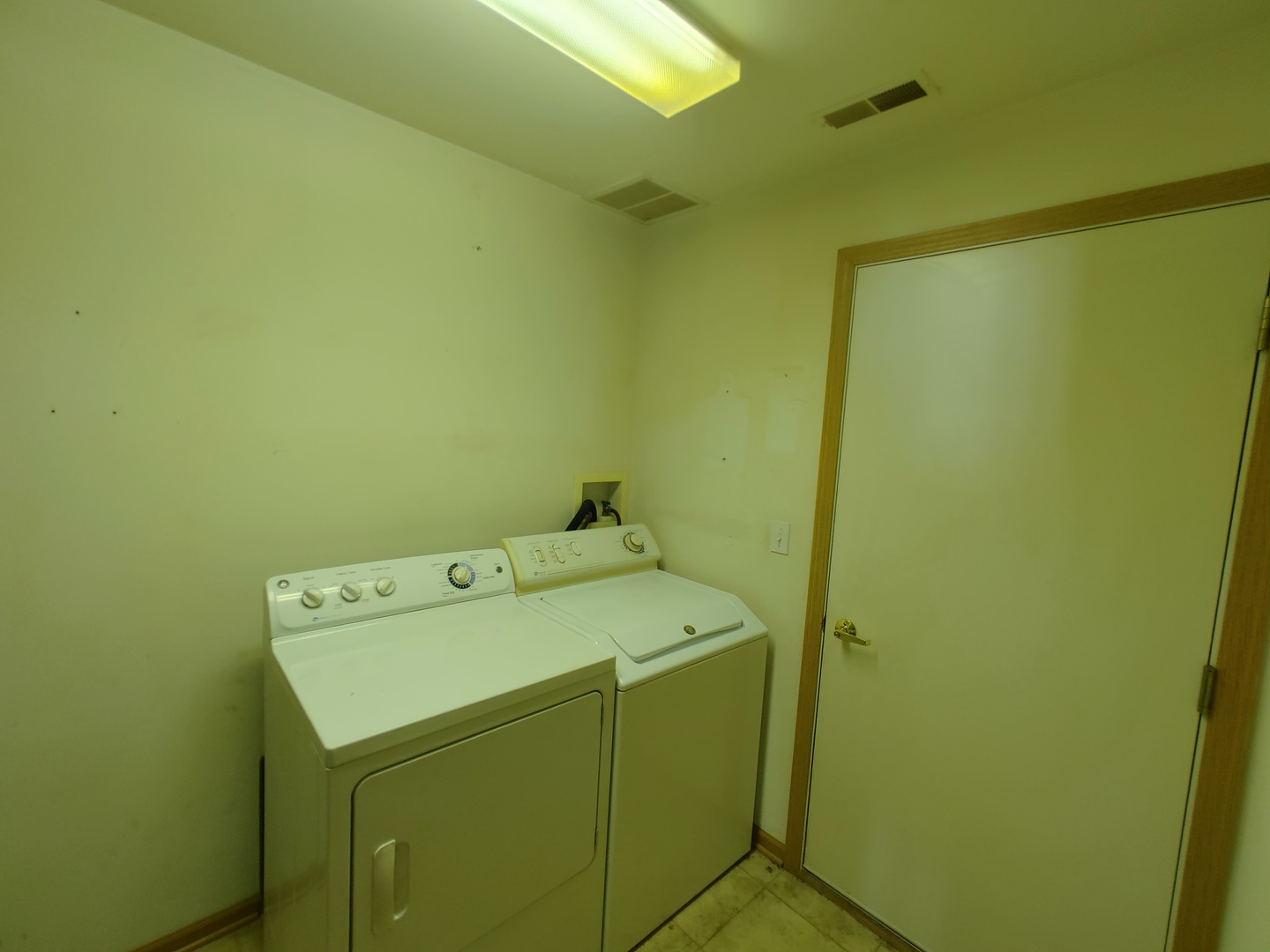 13528 Delaney Road Huntley, IL 60142 - Photo 7 of 25 a utility room with dryer and washer