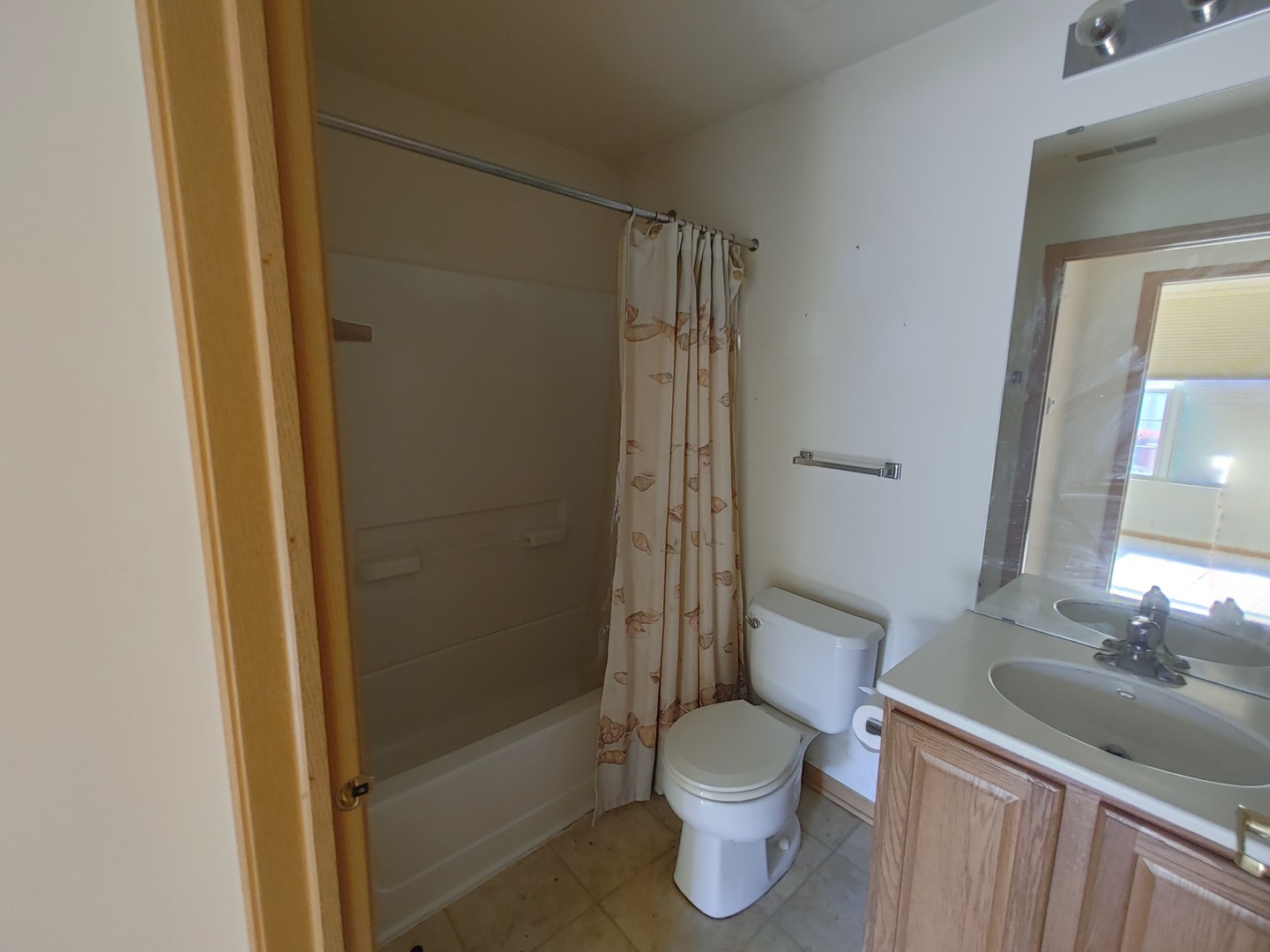 13528 Delaney Road Huntley, IL 60142 - Photo 8 of 25 a bathroom with a granite countertop sink toilet and shower
