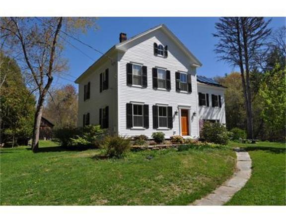 124 North Valley Road Pelham, MA 01002 - Photo 1 of 29 a front view of a house with a yard