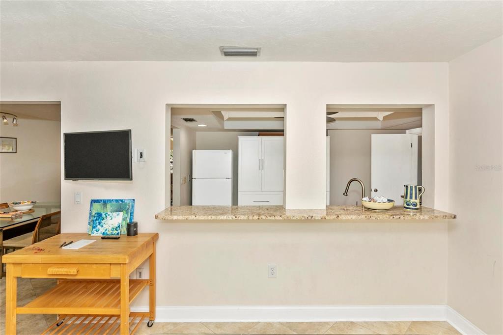 3039 Chase Circle Sarasota, FL 34231 - Photo 22 of 55 a bathroom with a sink and a mirror