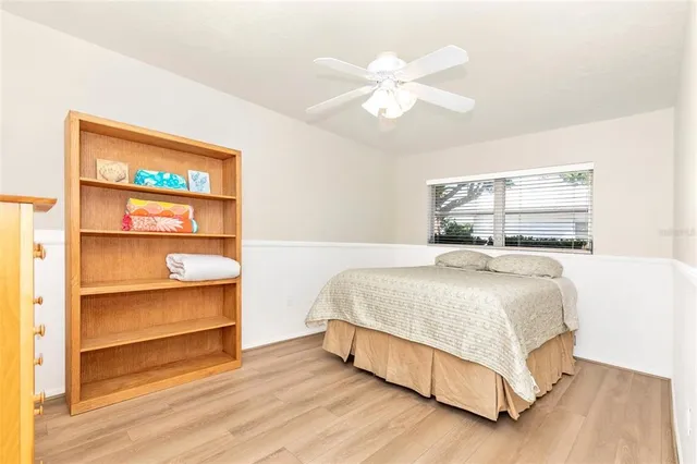 a bathroom with a sink a mirror and a shower