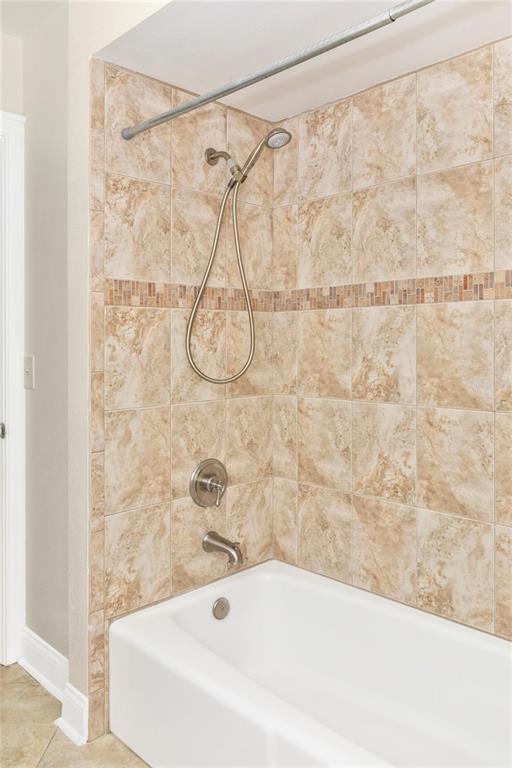 3039 Chase Circle Sarasota, FL 34231 - Photo 38 of 55 a bathroom with a bathtub and shower