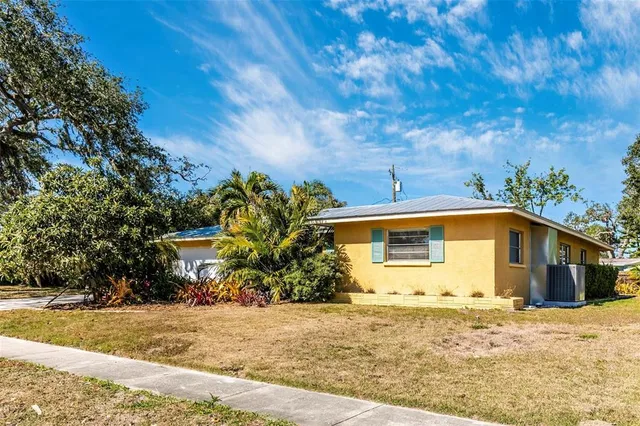 a view of a swimming pool with an outdoor space and seating area
