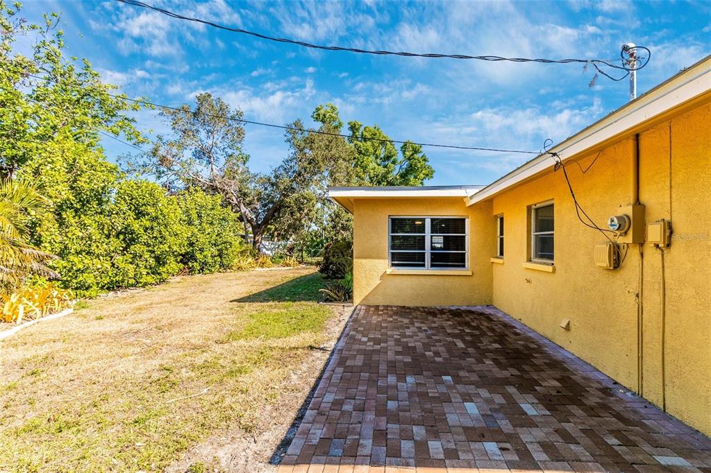 3039 Chase Circle Sarasota, FL 34231 - Photo 48 of 55 a front view of a house with a yard