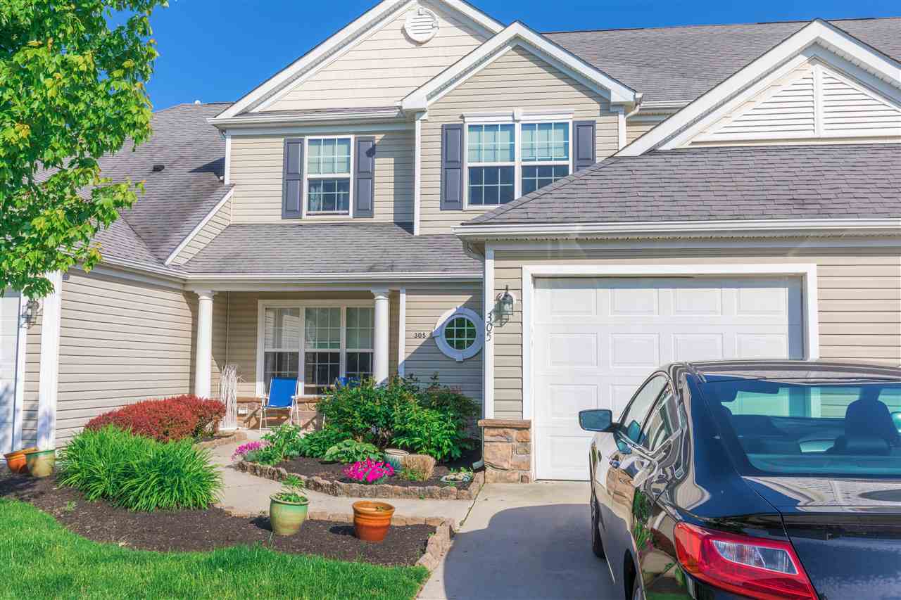 305 Seacrest Lane, Unit 305 Rio Grande, NJ 08242 - Photo 1 of 1 a front view of a house with garden