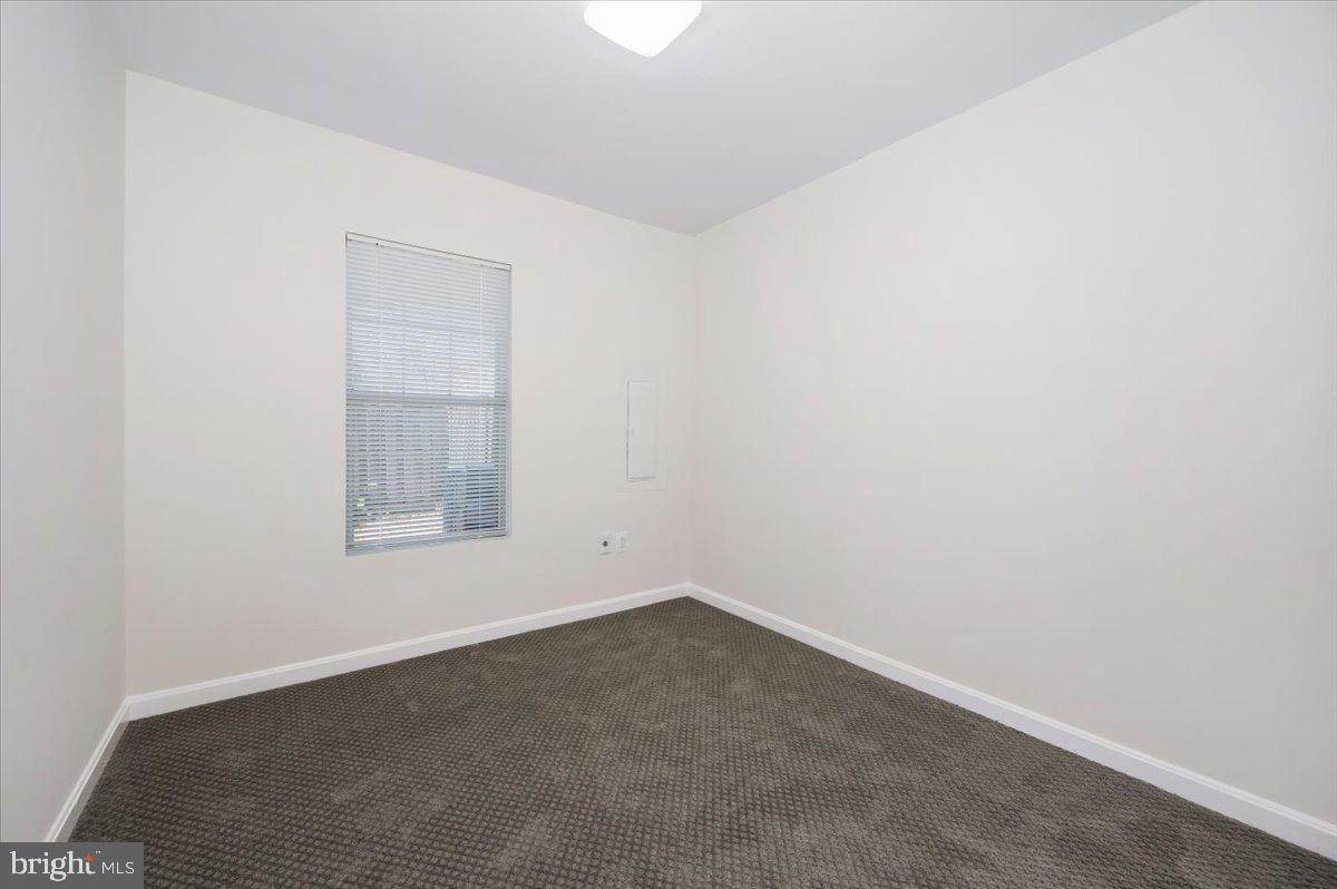 12144 Turnstone Court, Unit 87 Silver Spring, MD 20904 - Photo 27 of 56 an empty room with a window