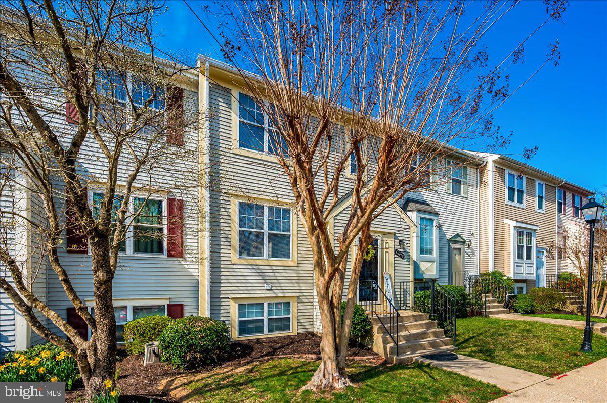 12144 Turnstone Court, Unit 87 Silver Spring, MD 20904 - Photo 4 of 56 a view of a house with a yard