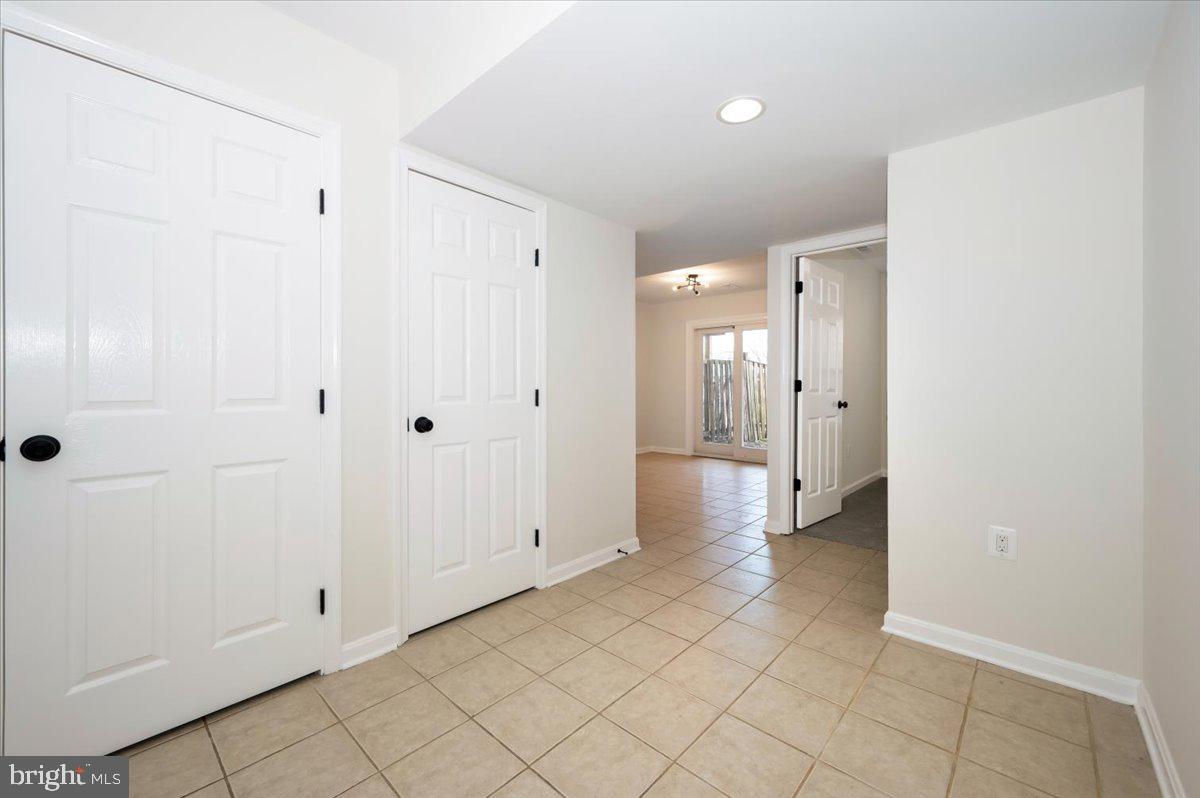 12144 Turnstone Court, Unit 87 Silver Spring, MD 20904 - Photo 44 of 56 a view of a bathroom with a shower and a sink