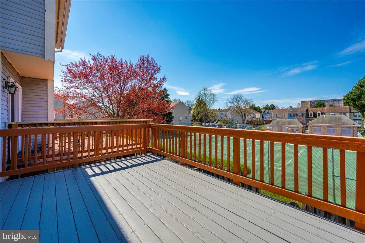 12144 Turnstone Court, Unit 87 Silver Spring, MD 20904 - Photo 47 of 56 a view of balcony with wooden floor