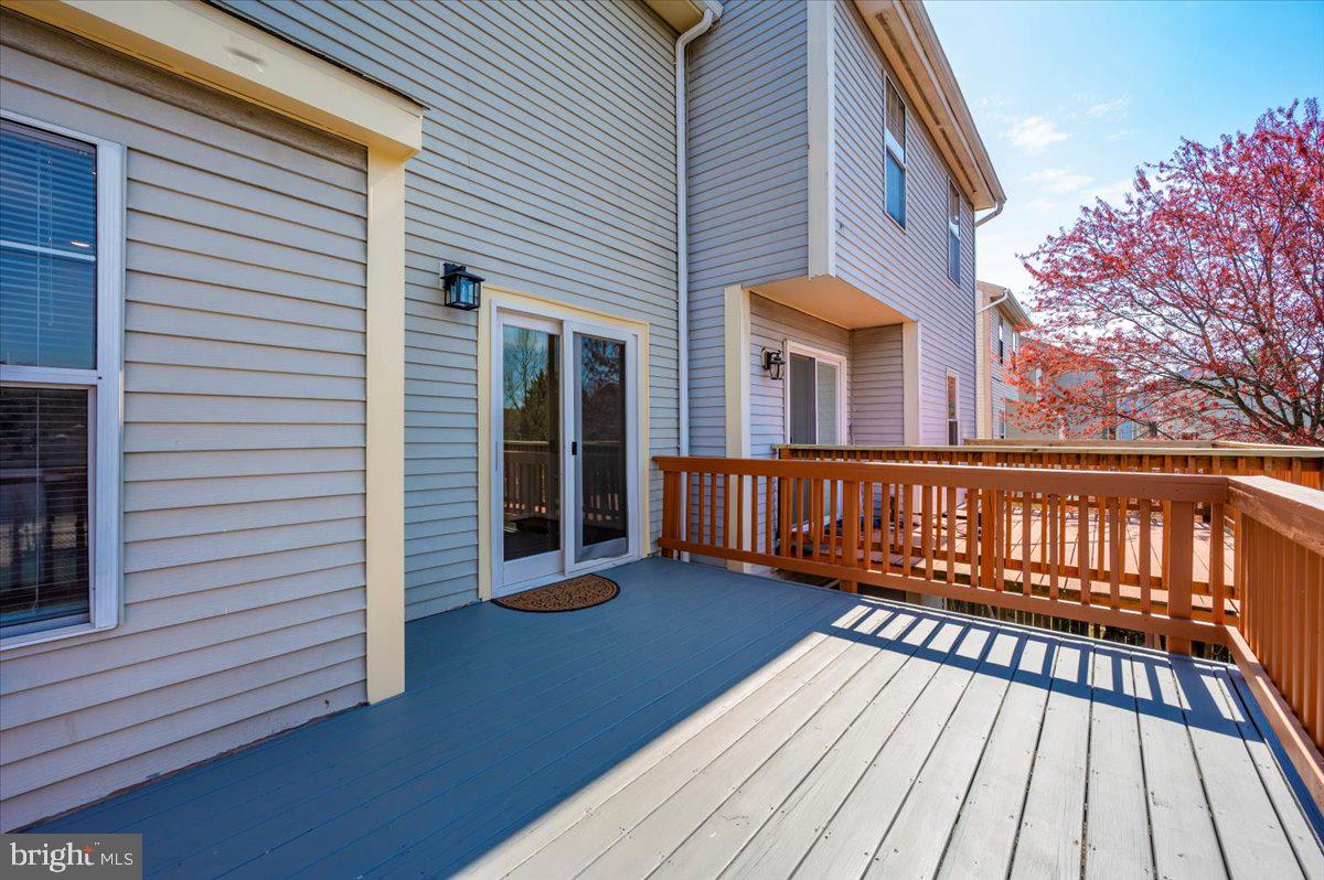 12144 Turnstone Court, Unit 87 Silver Spring, MD 20904 - Photo 49 of 56 a view of a wooden deck