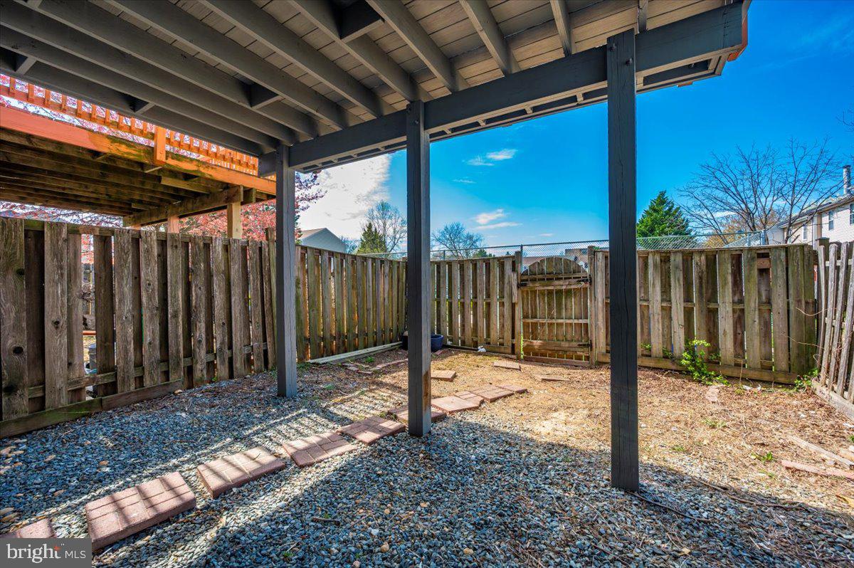 12144 Turnstone Court, Unit 87 Silver Spring, MD 20904 - Photo 53 of 56 a view of a backyard with wooden fence