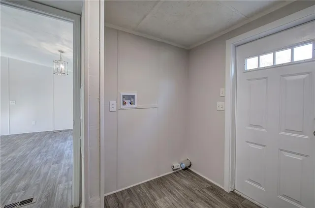 a view of small space with wooden floor