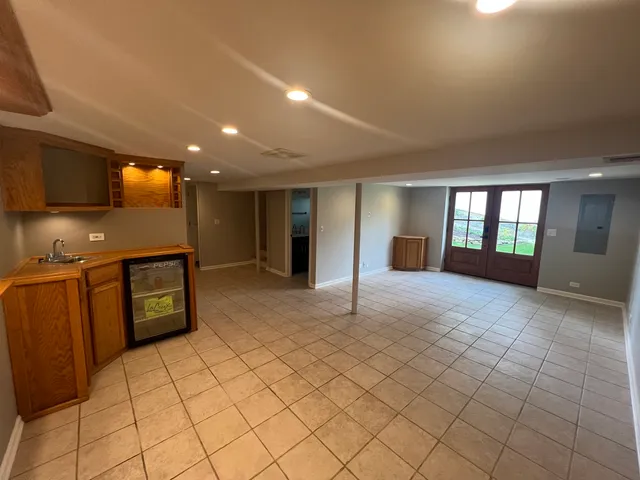 a view of an empty room and window