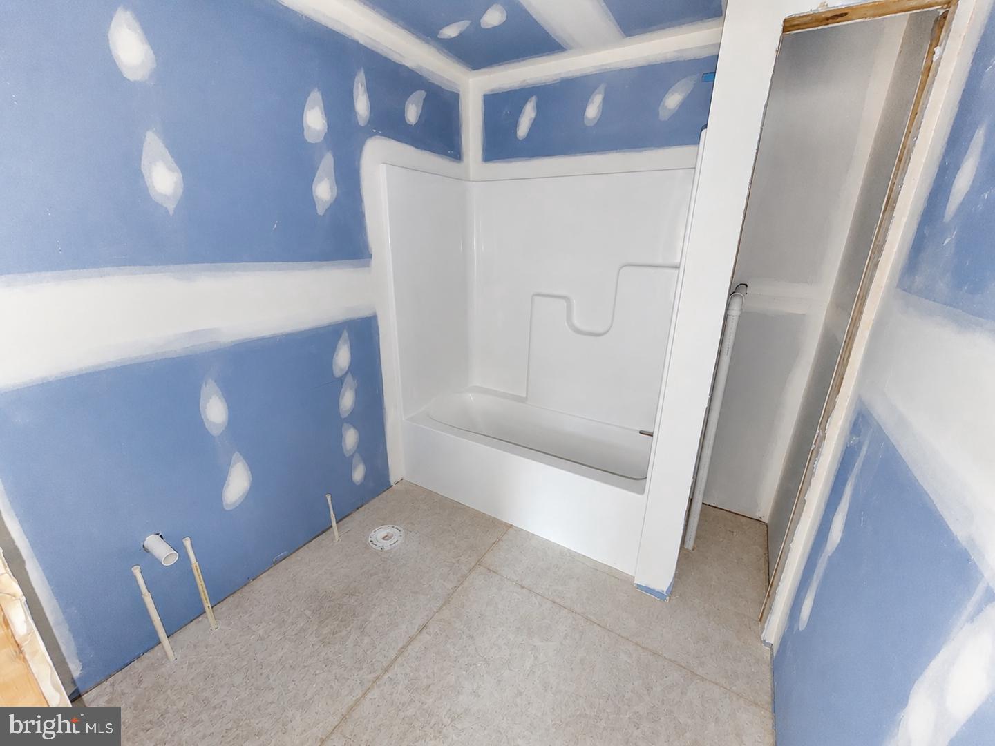 4 Libby's Ridge Road Berkeley Springs, WV 25411 - Photo 29 of 36 Freshly primed bathroom ready for design.