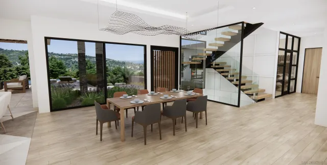 a view of a dining room with furniture large windows and wooden floor